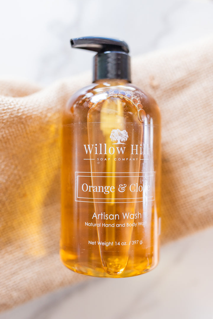 Willow Hill Soap Company Orange and Clove hand and body wash on a blanket